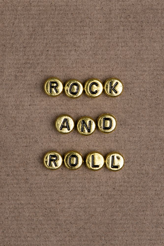 ROCK AND ROLL beads word typography on texture background