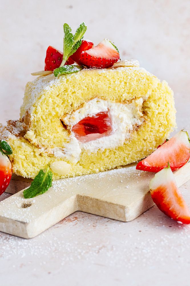 Fluffy strawberry Swiss roll food photography
