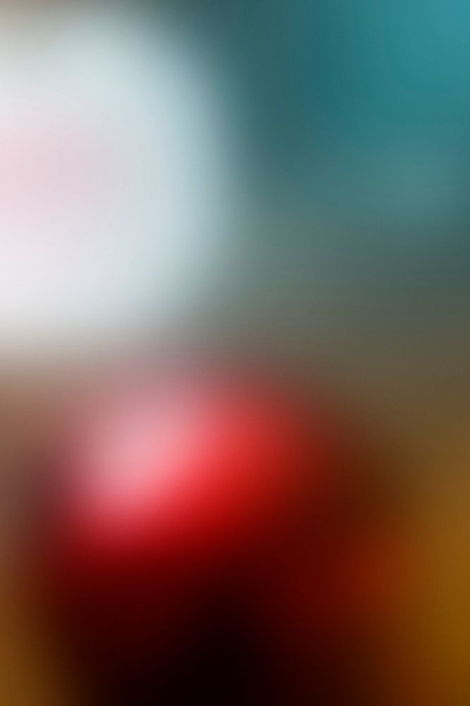 Blurry red and white Christmas baubles background