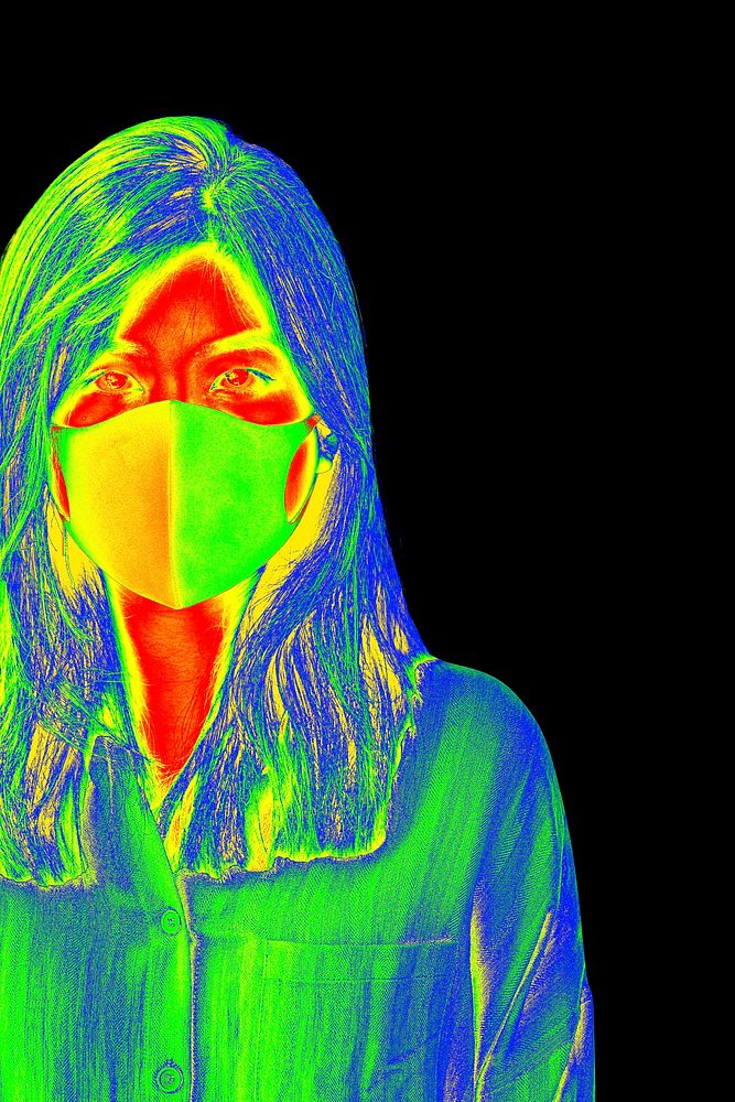 Woman wearing a face mask during coronavirus pandemic thermal image