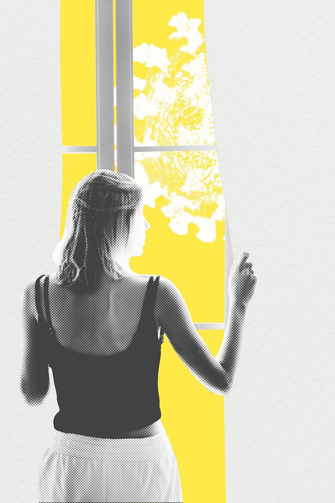 Young woman looking out of the window during coronavirus quarantine