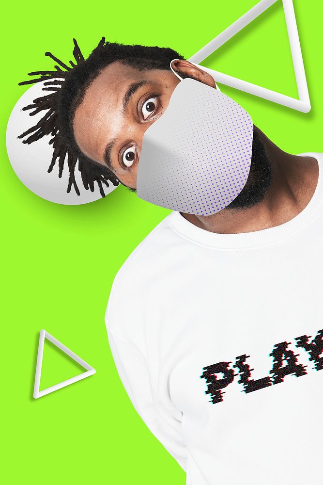 Man wearing face mask on green background