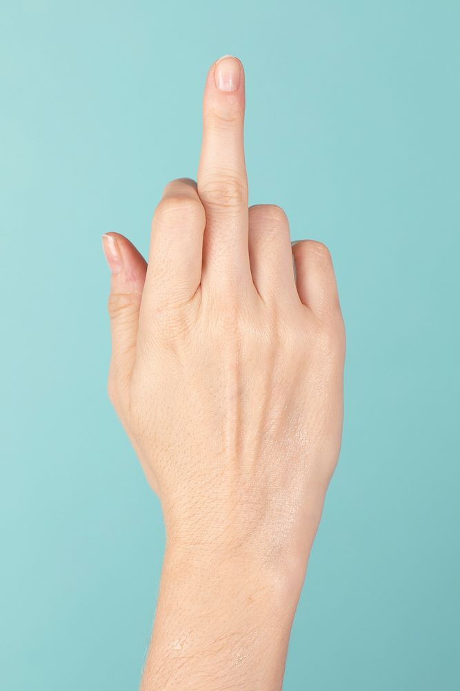 Feminine hand showing middle finger