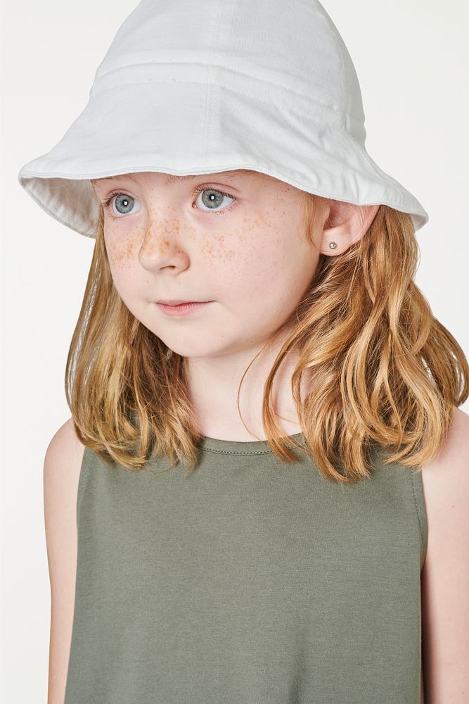 Girl wearing tank top and bucket hat