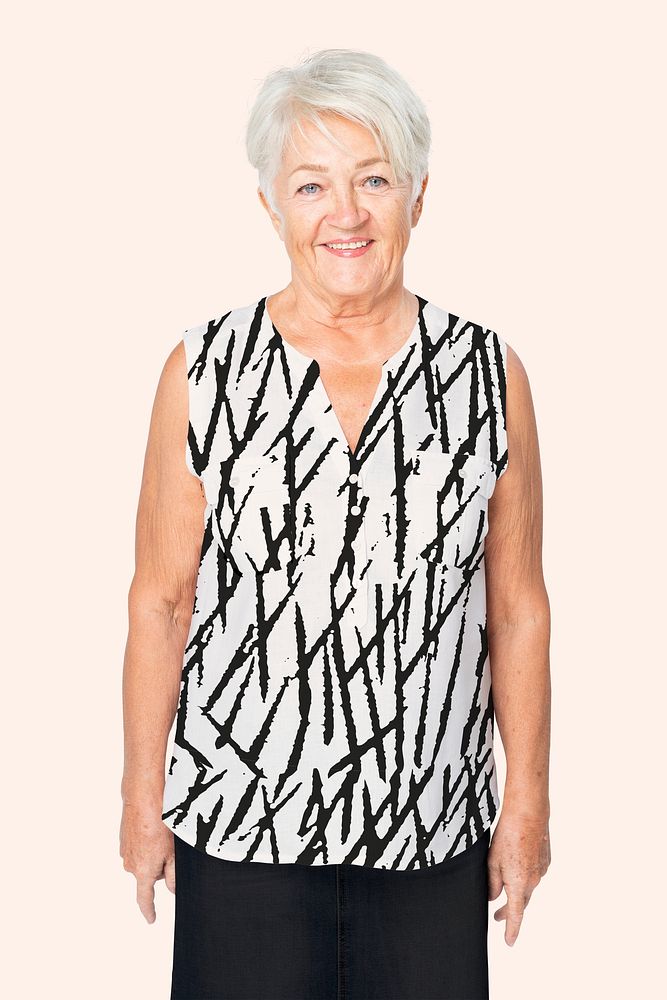 Senior woman in black and white abstract design blouse studio portrait