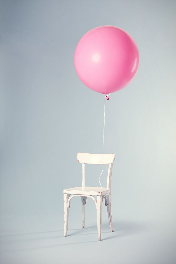 Pink balloon on a white chair. Original public domain image from Wikimedia Commons