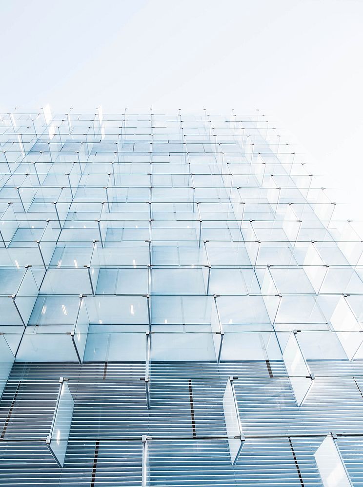 Glass panels in the modern facade of a building in Madrid. Original public domain image from Wikimedia Commons