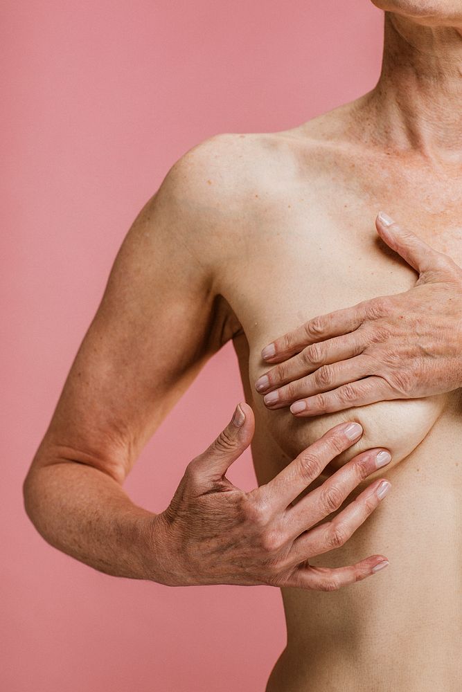 Elderly woman being aware of breast cancer
