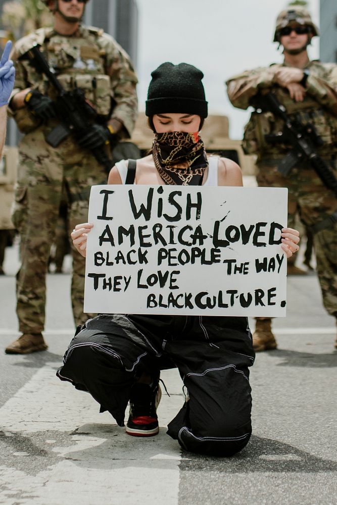 Masked woman at the Black Lives Matter protests at Hollywood & Vine. 2 JUN, 2020, LOS ANGELES, USA