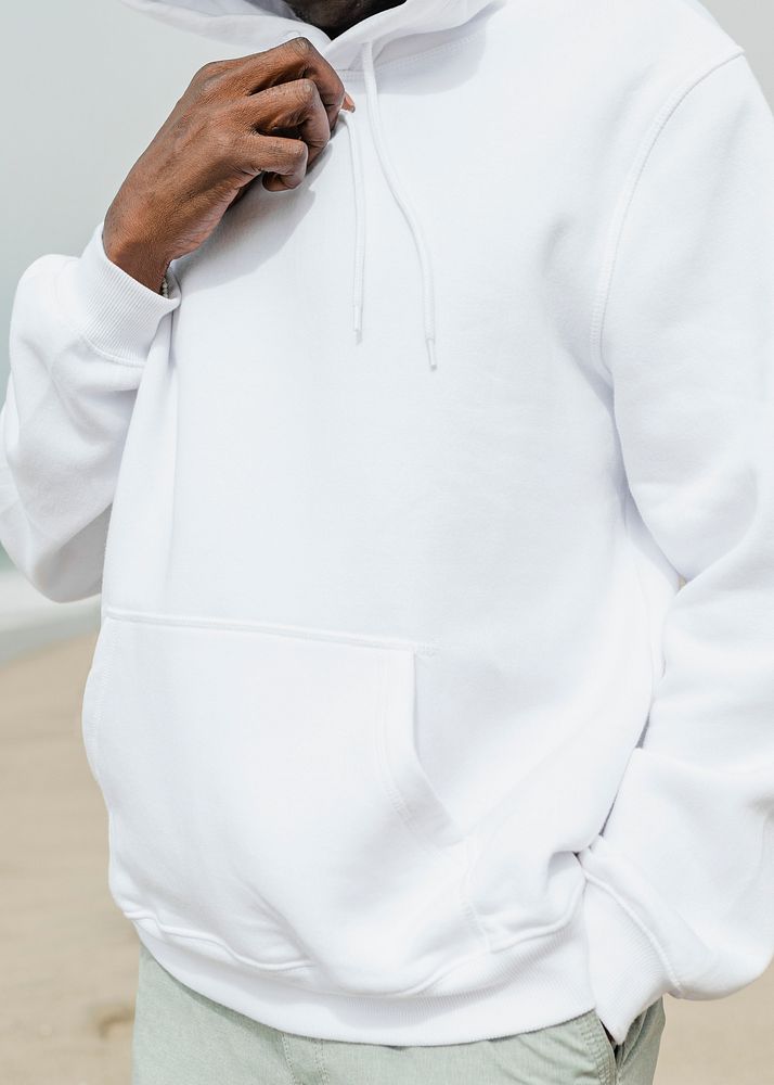 African American man in hoodie posing outdoor photoshoot