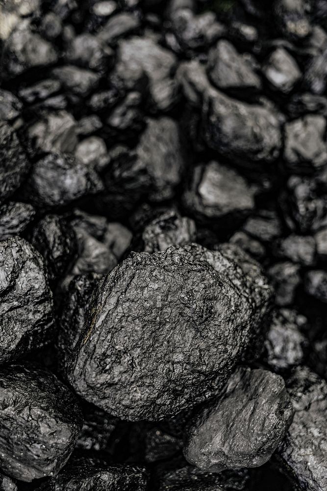 Black pebbles macro shot background
