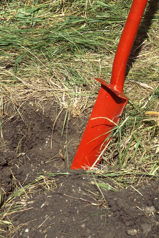 Digging hole for soil survey in Gallatin County, 1999. Original public domain image from Flickr