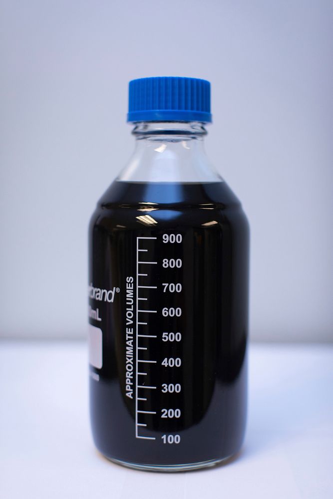 Approximately 1 liter of graphene quantum dots dispersed in water manufactured by NETL from domestic coal feedstocks.