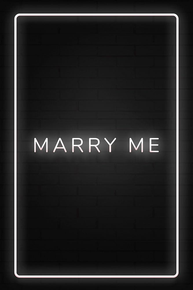 Glowing Marry me neon typography on a black background