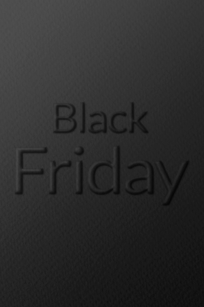 Word black friday embossed typography on paper texture