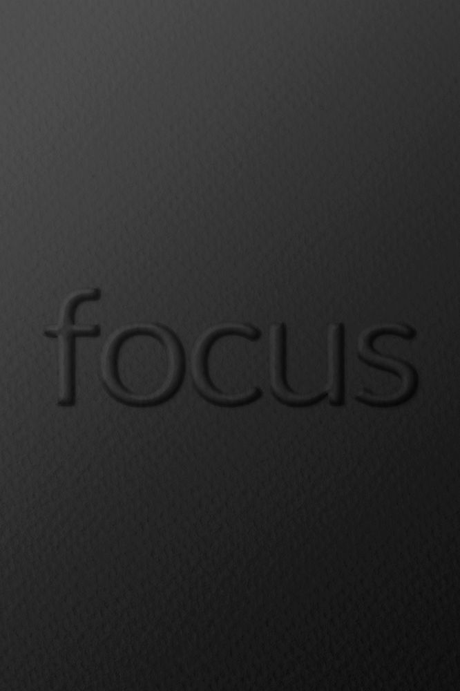 Focus embossed typography on paper texture