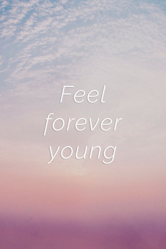 Feel forever young quote on a pastel sky background