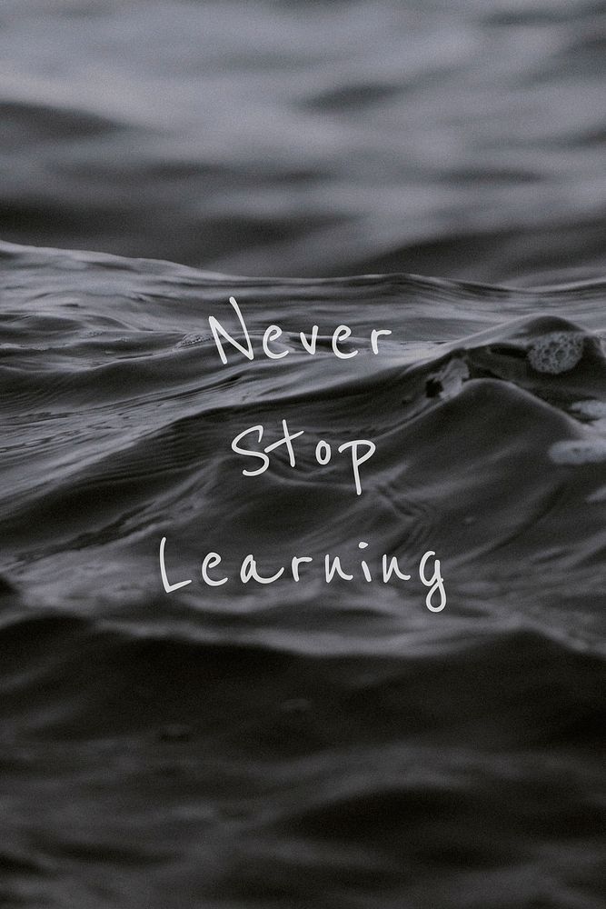 Never stop learning quote on a water wave background