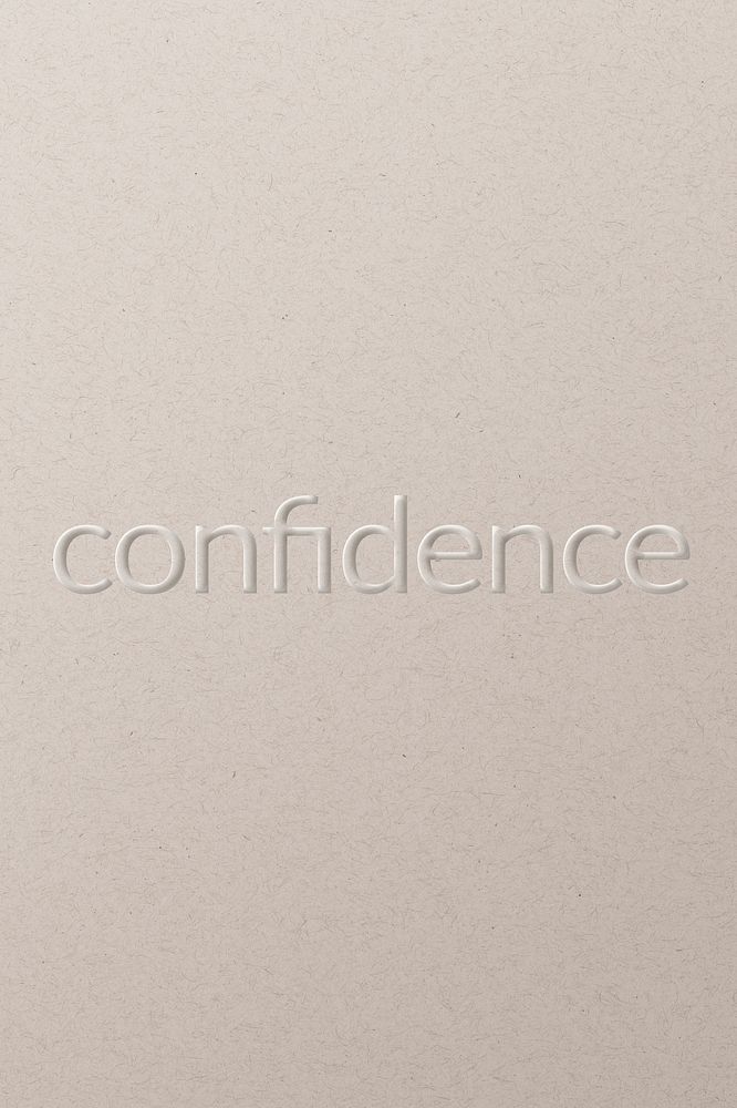 Confidence embossed font white paper background