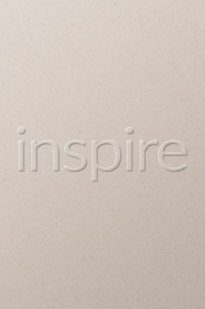 Inspire embossed font white paper background