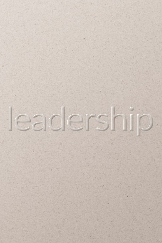 Leadership embossed text white paper background