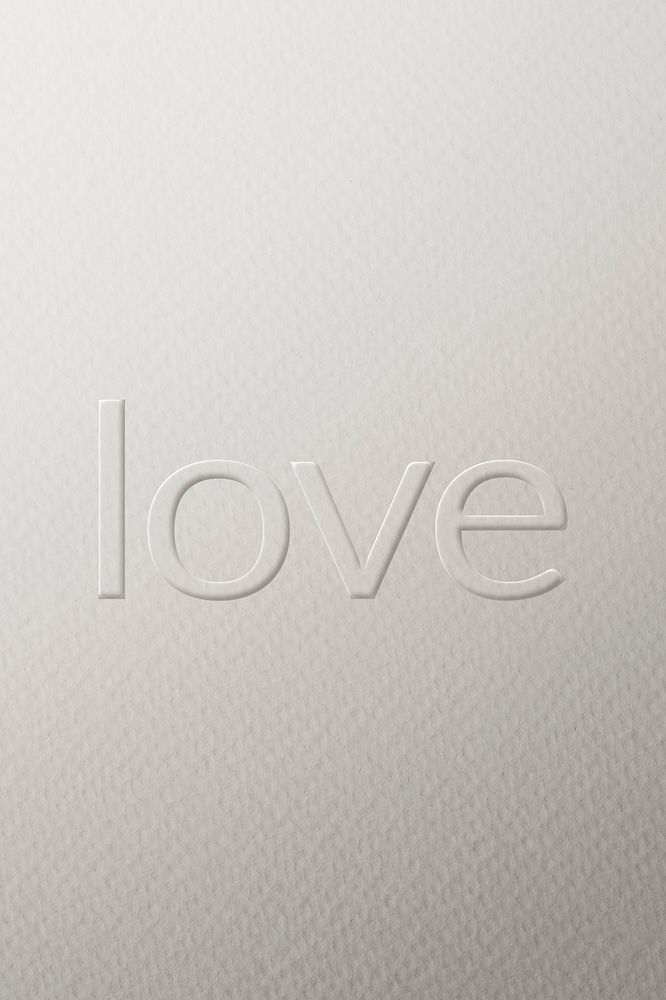 Love embossed typography white paper background