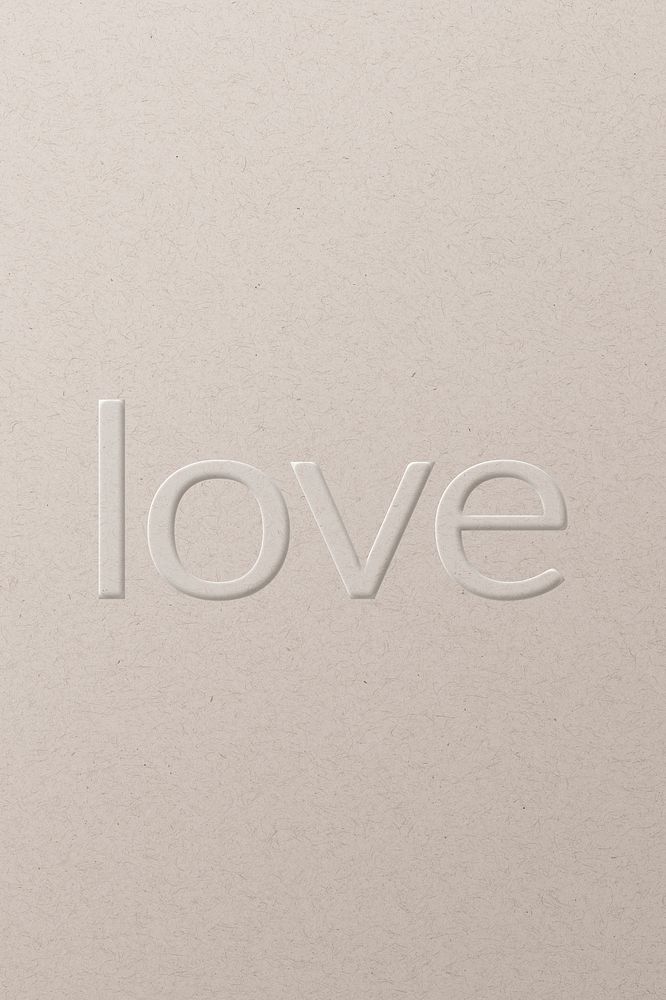 Love embossed text white paper background