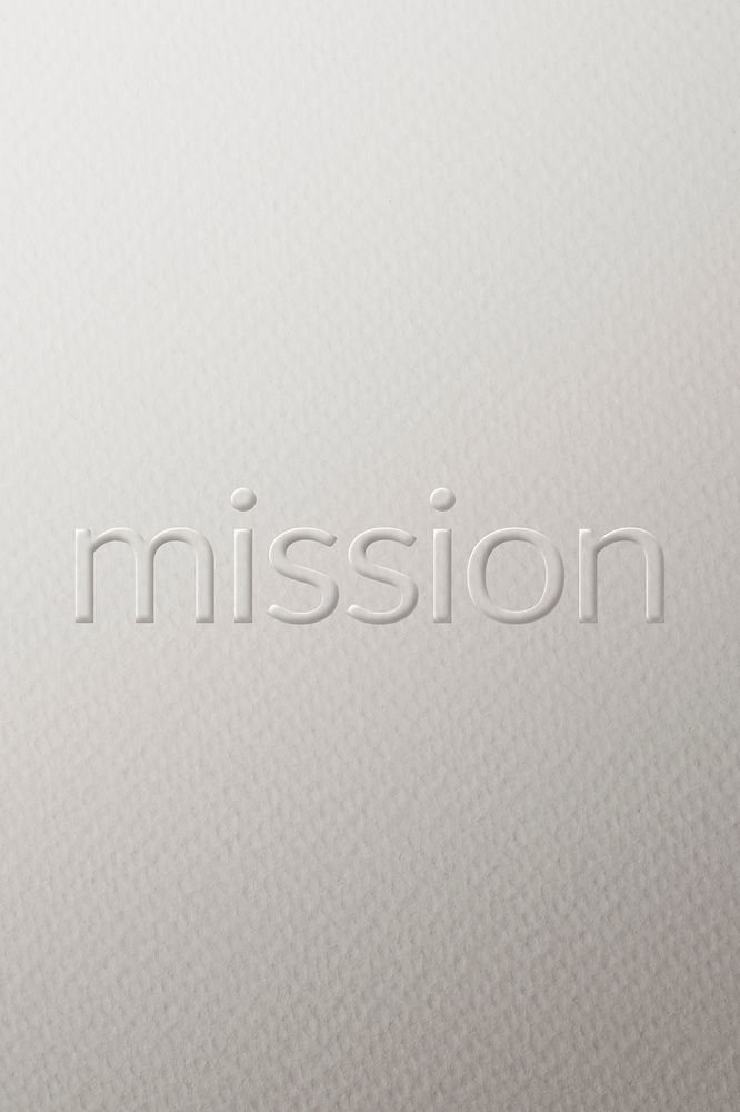 Mission embossed typography white paper background