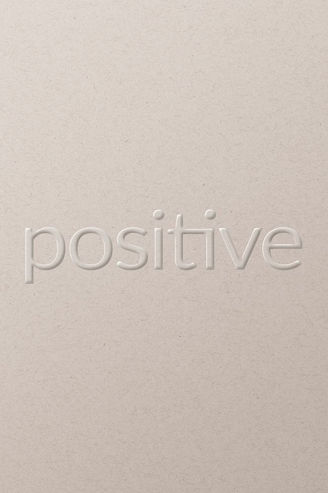 Positive embossed text white paper background