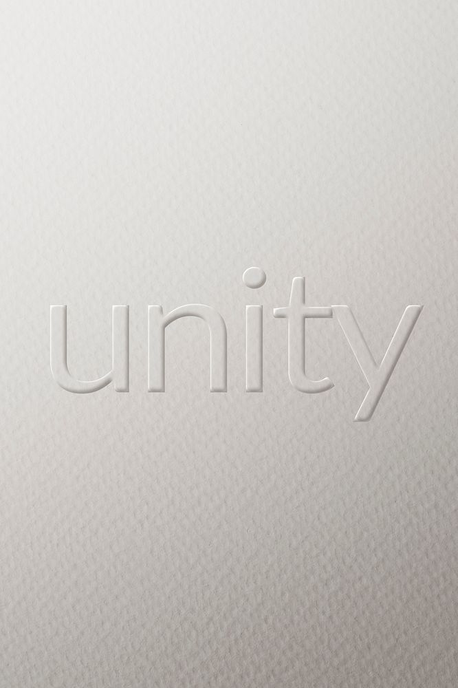 Unity embossed text white paper background