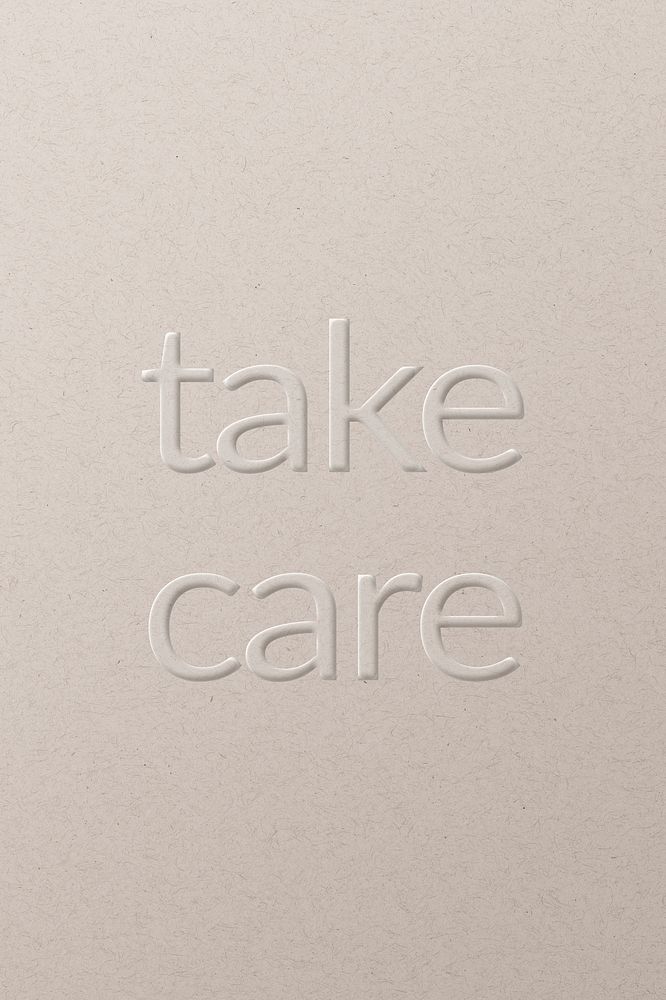 Take care embossed text white paper background