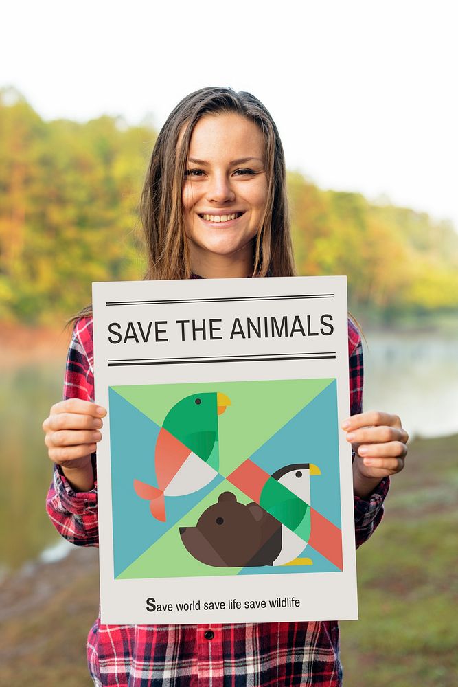 Woman holding save animals banner