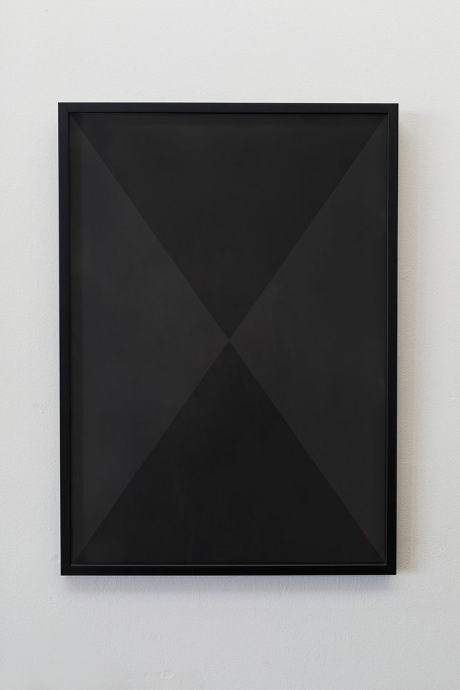 Black frame against a gray wall
