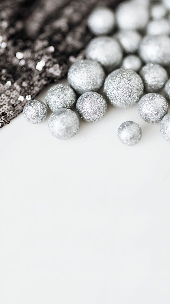 Glitter silver baubles and sequin textile