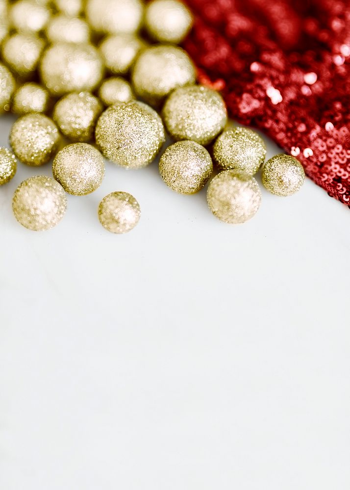 Glitter gold baubles and red sequin textile
