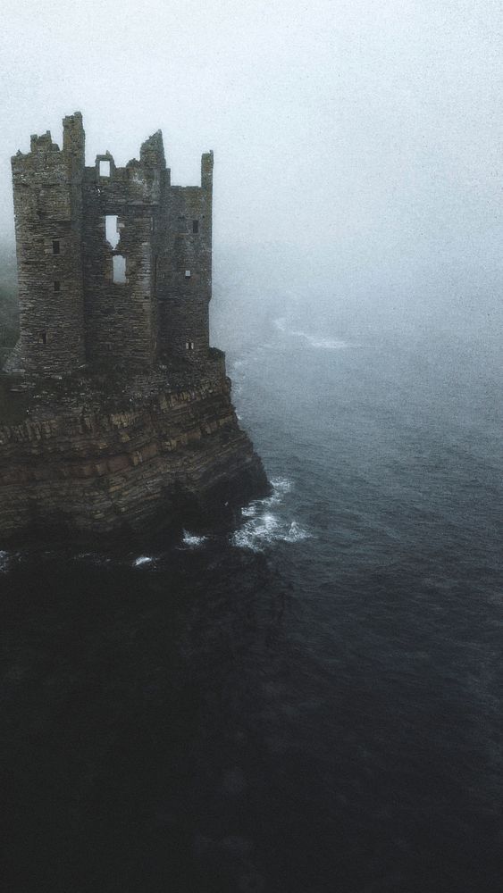 Misty view of Keiss Castle, Scotland