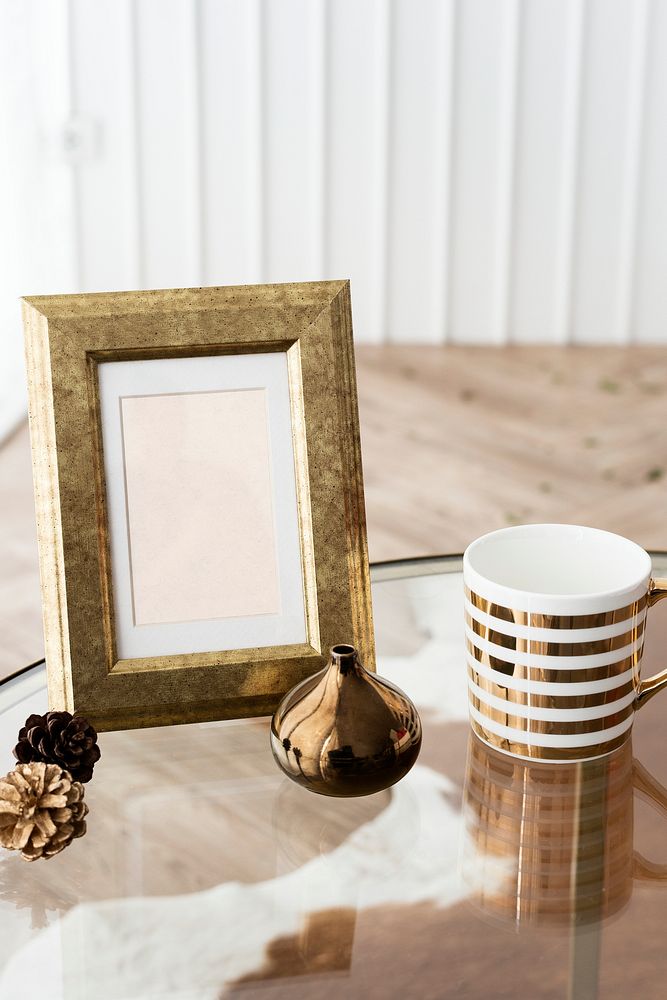 Golden photo frame on a table