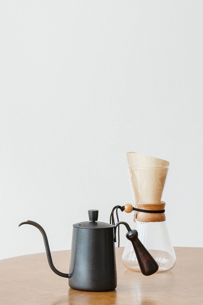 Black kettle and glass hand drip coffee with design space