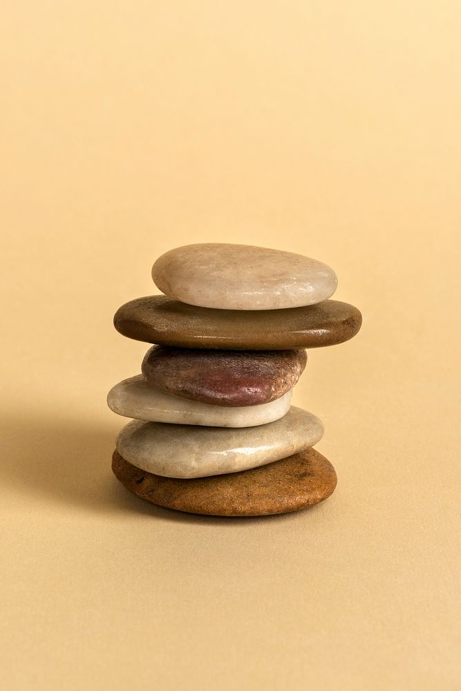 Natural stacked stone on brown background