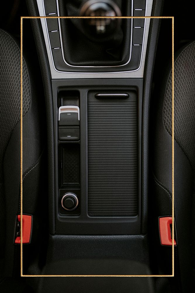 Gold rectangle frame on a black car center console space