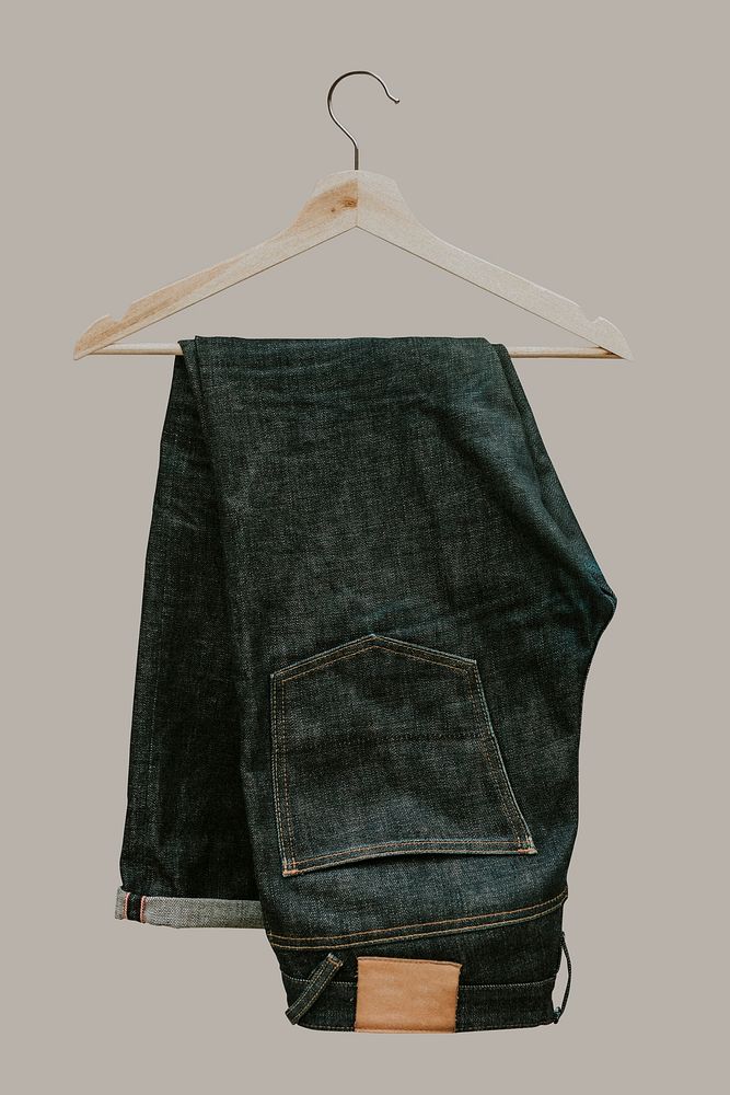 Dark blue jeans on a wooden hanger mockup