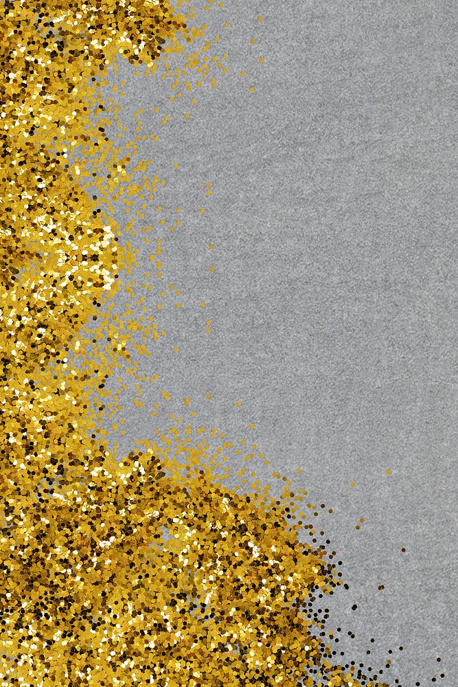 Shimmering gold confetti on a gray background 