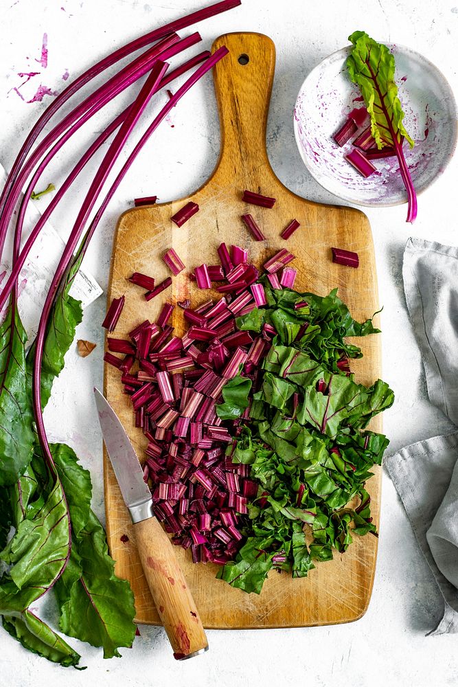 Chopped beetroot on a wooden board aerial view