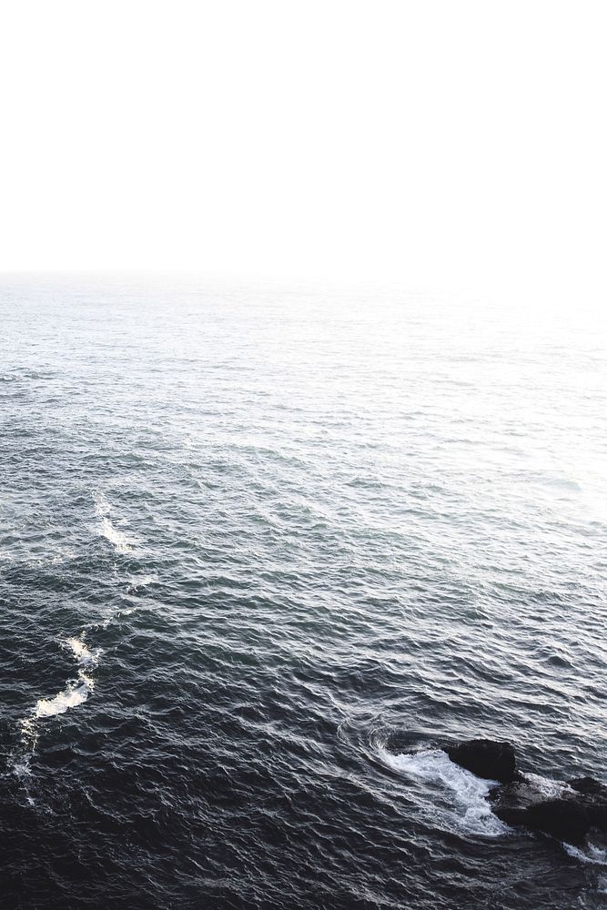 View of a misty deep blue ocean