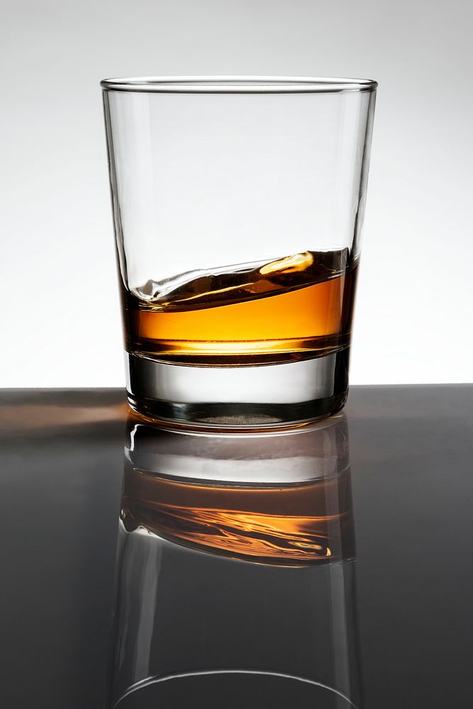 Swirling whisky in a glass
