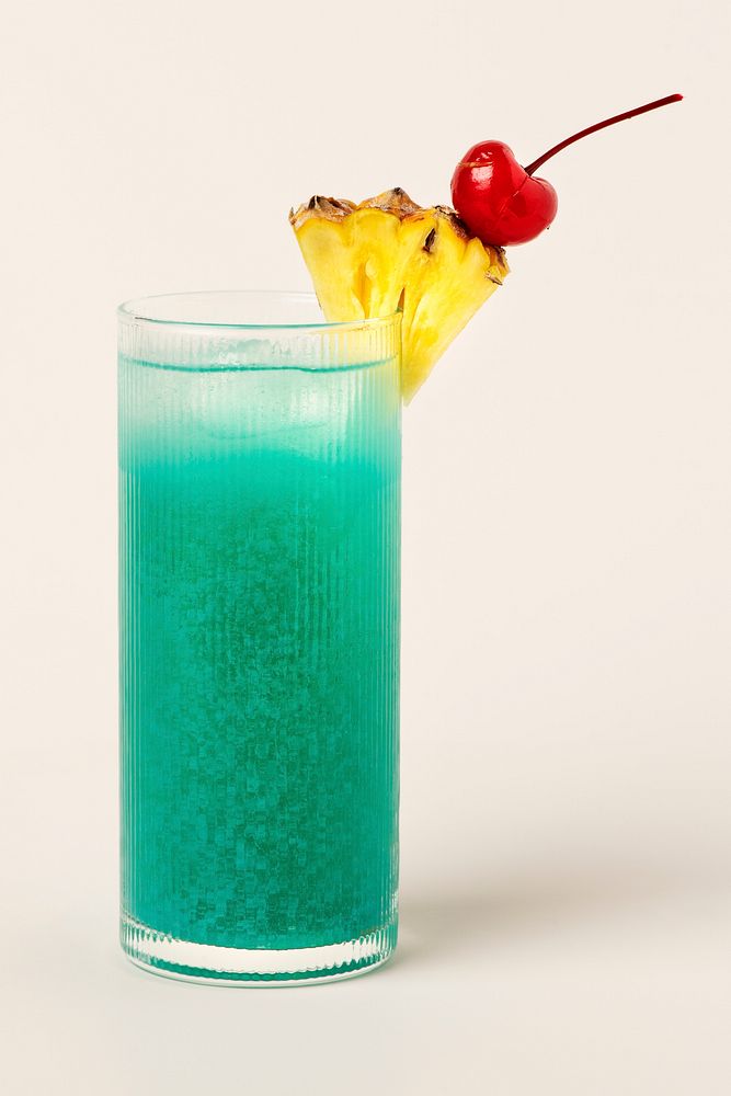 Blue Hawaii cocktail with pineapple and cherry