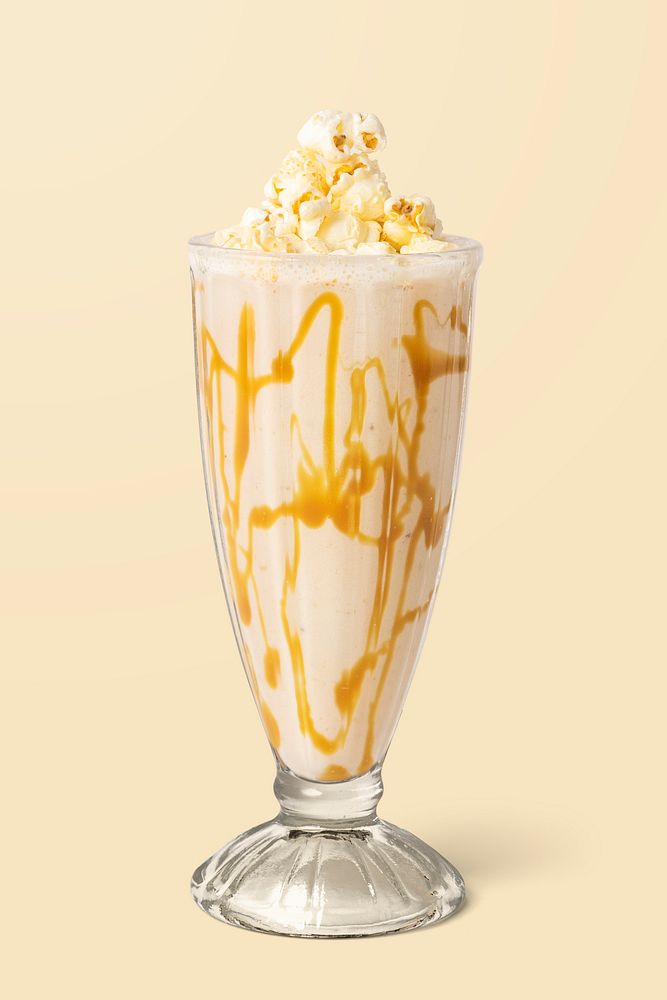 Caramel popcorn vanilla milkshake on background