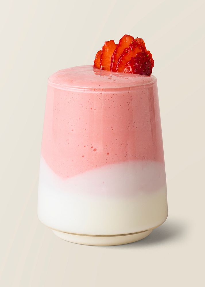 Layered strawberry and yogurt smoothie on background