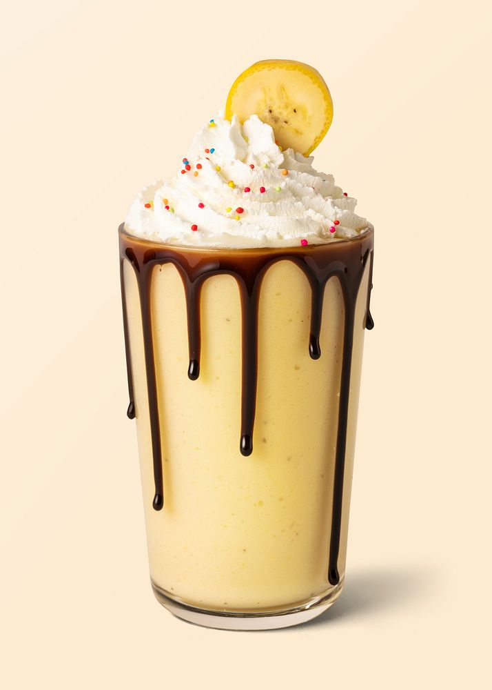Chocolate banana milkshake with whipped cream on background