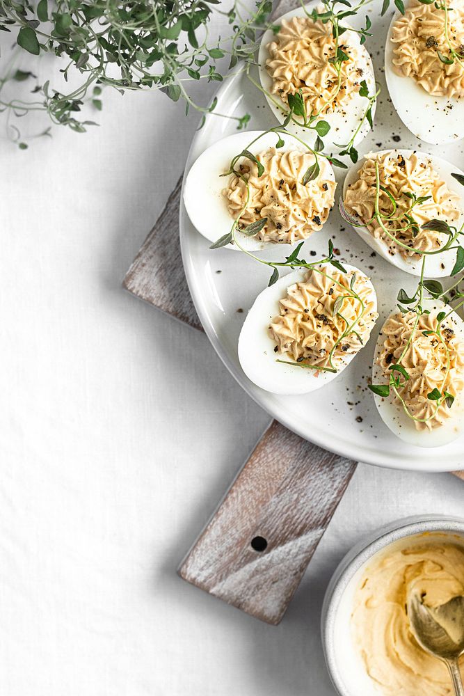Deviled eggs on a white plate